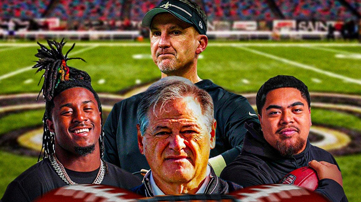 Mickey Loomis in the middle, Taliese Fuaga, Kool-Aid McKinstry, Coach Dennis Allen around him, New Orleans Saints wallpaper in the background