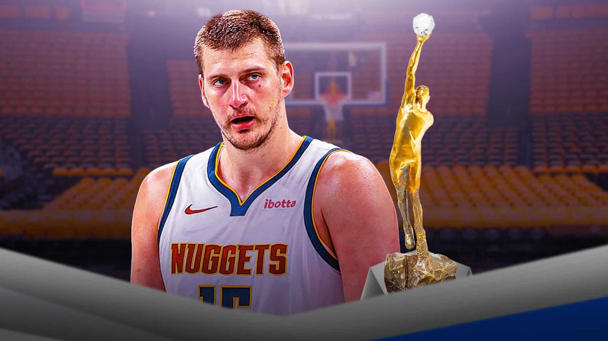 Nikola Jokic alongside the NBA MVP trophy with the Nuggets arena in the background