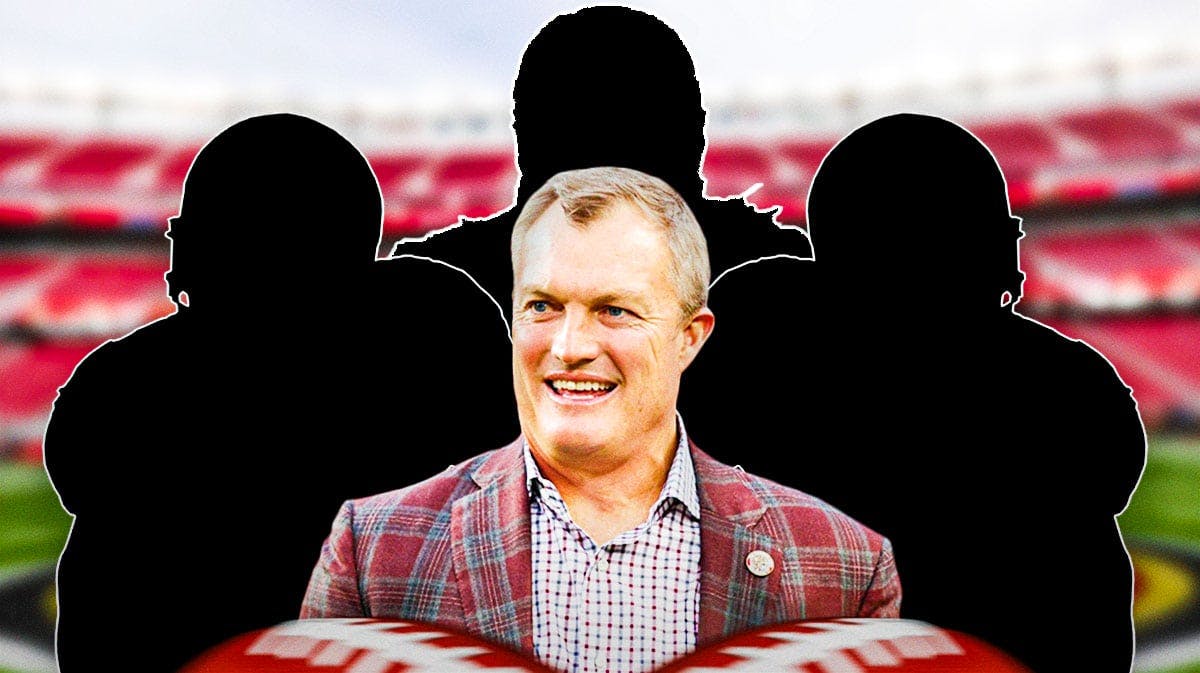 John Lynch in the middle, 3 mystery players around him, San Francisco 49ers wallpaper in the background