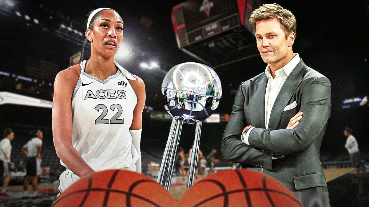 Las Vegas Aces player A'ja Wilson, with Tom Brady, and the WNBA Championship trophy