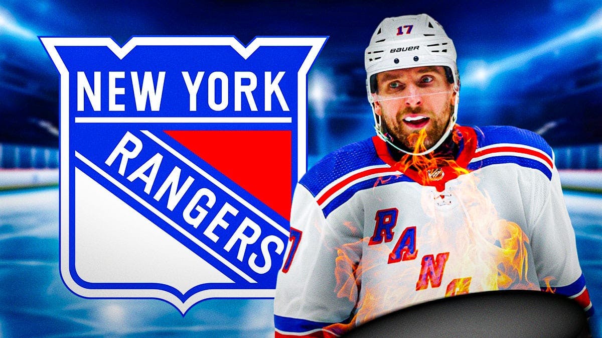 Blake Wheeler in middle of image looking happy with fire around him, New York Rangers logo, hockey rink in background