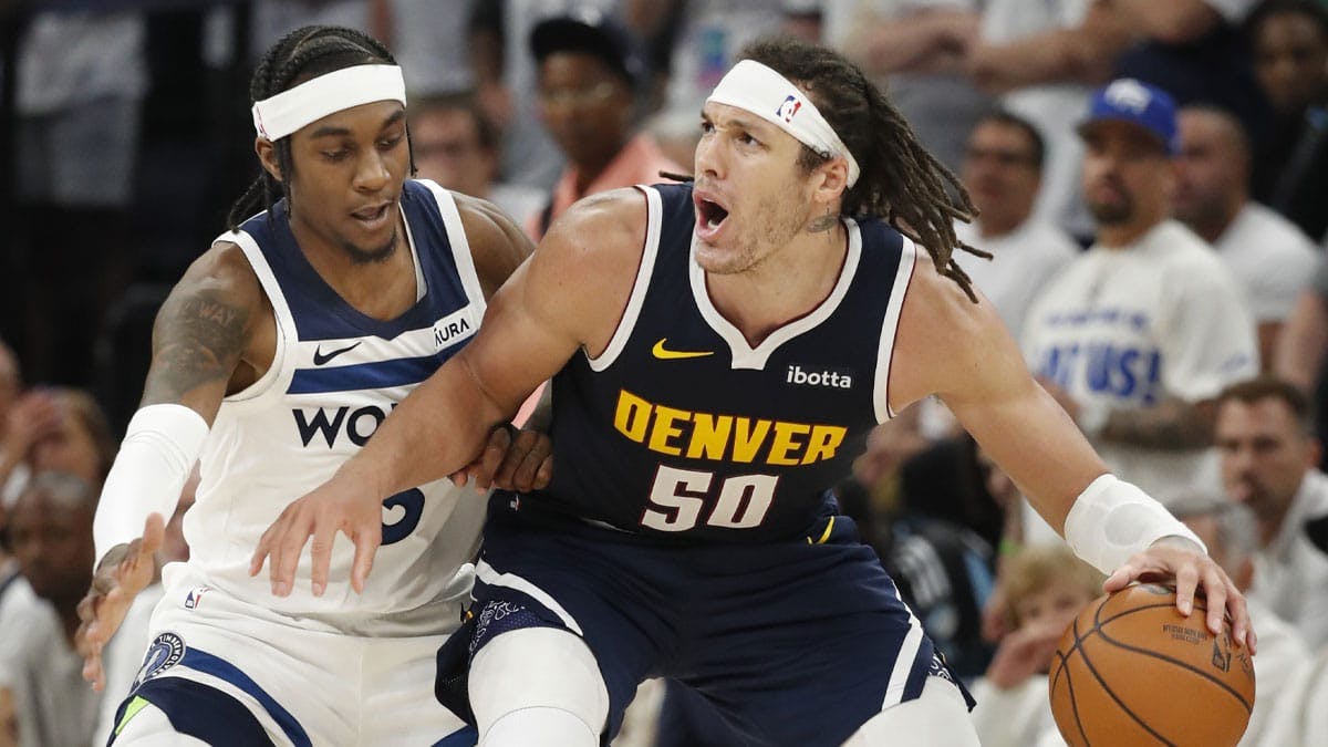 Denver Nuggets forward Aaron Gordon (50) works around Minnesota Timberwolves forward Jaden McDaniels (3) in the fourth quarter of game four of the second round for the 2024 NBA playoffs at Target Center.