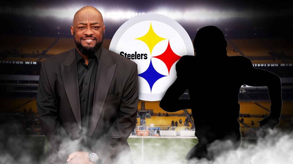 Mike Tomlin next to a silhouette