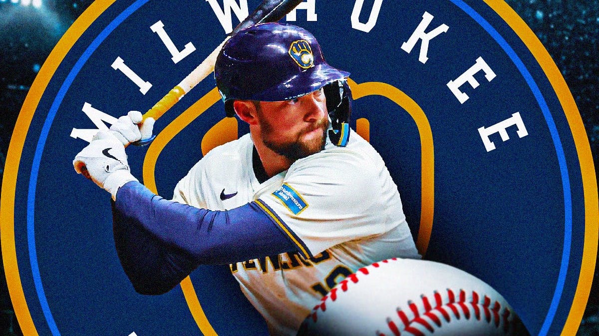 Rhys Hoskins with Brewers logo