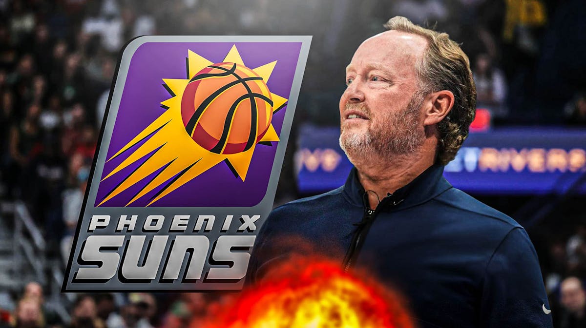 Mike Budenholzer in image looking happy, Phoenix Suns logo, basketball court in background