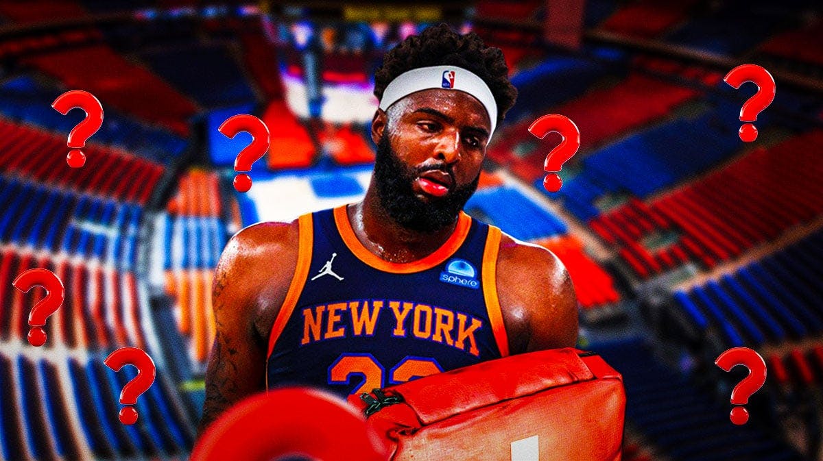 Mitchell Robinson with a bunch of question marks around him and an injury kit in front of him