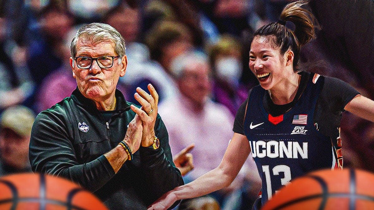 UConn women's basketball coach Geno Auriemma, and Princeton women's basketball player Kaitlyn Chen, with a jersey swap so she is in a UConn jersey.