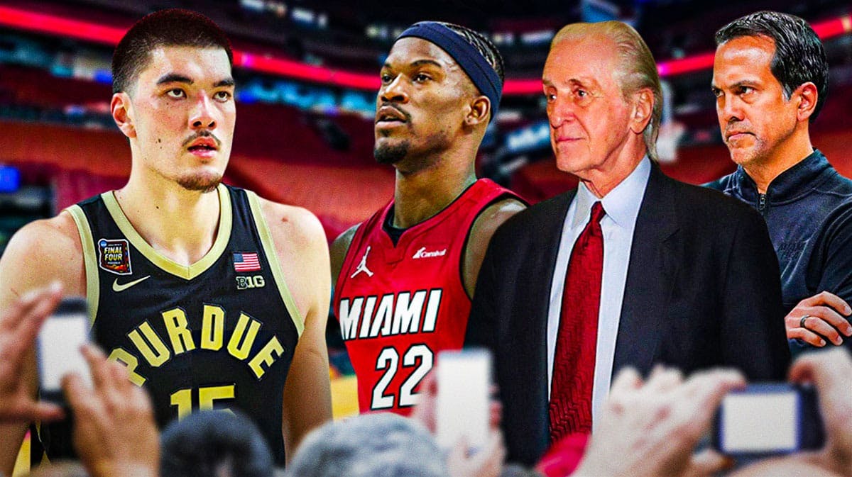Miami Heat star Jimmy Butler, head coach Erik Spoelstra, and president Pat Riley looking at Zach Edey.