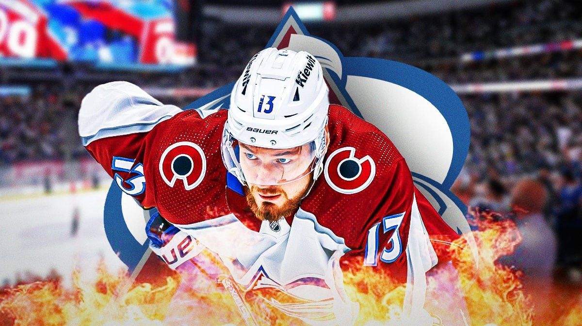 Valeri Nichushkin in middle of image looking stern with fire around him, Colorado Avalanche logo, hockey rink in background