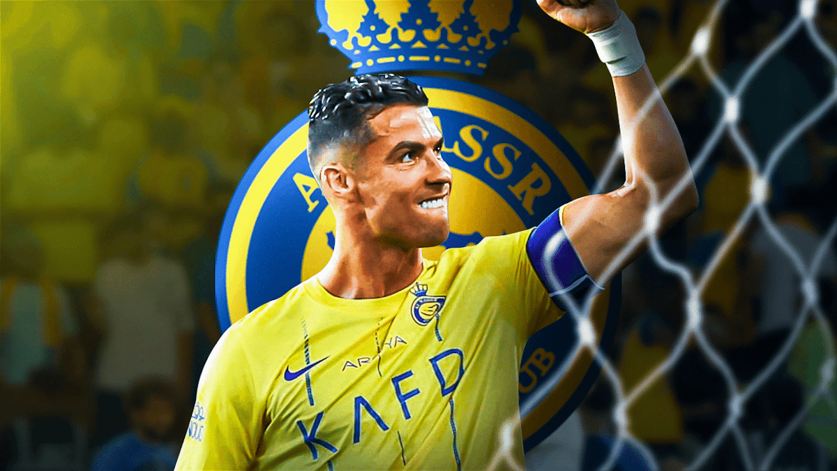Cristiano Ronaldo celebrating in front of a net, the Al-Nassr logo in the back