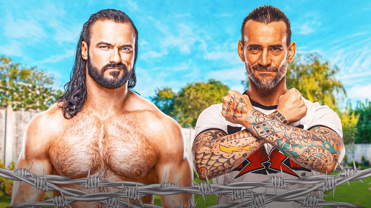Drew McIntyre next to CM Punk in a grassy green backyard with a fence.