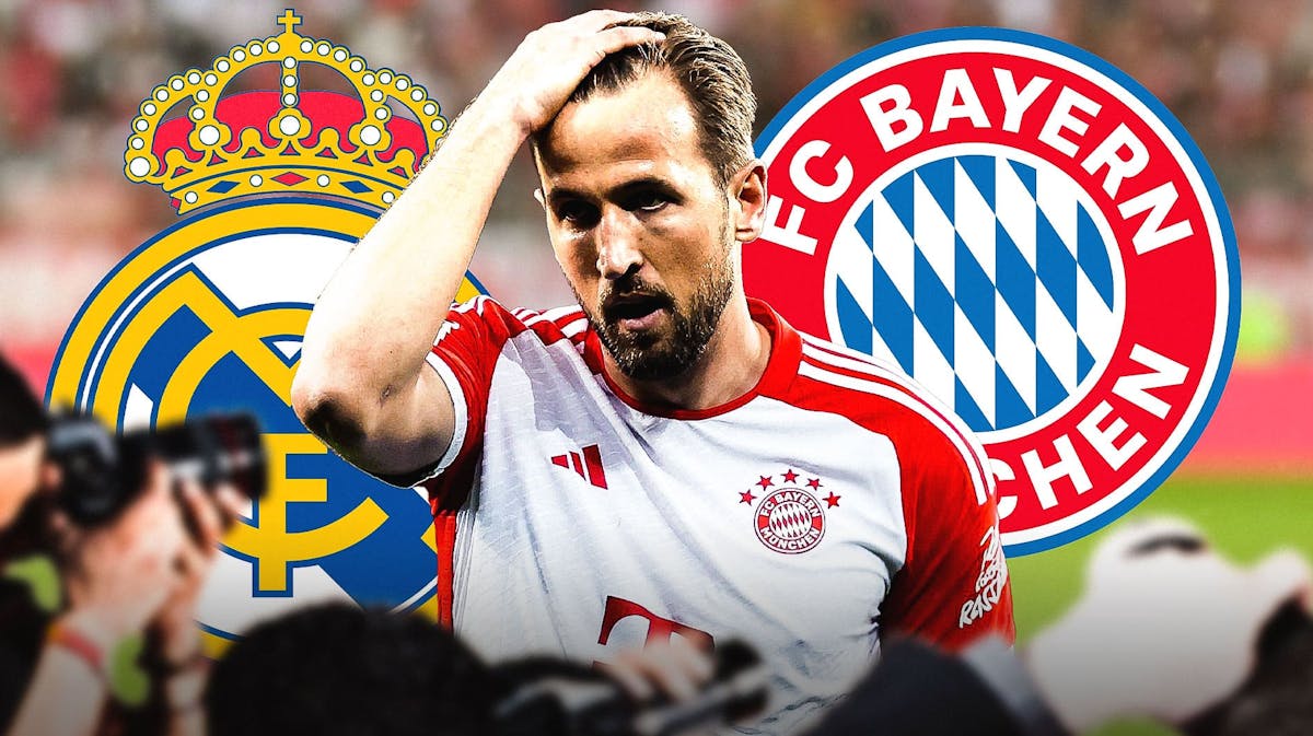 Harry Kane looking down/sad in front of the Real madrid and bayern Munchen logos