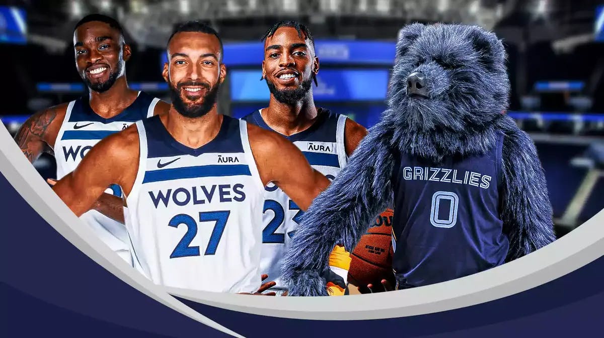 Troy Brown Jr., Shake Milton and Rudy Gobert smiling in front of Grizzlies mascot or fans.