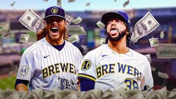 Brewers' Corbin Burnes and Devin Williams smiling, with money falling from the sky