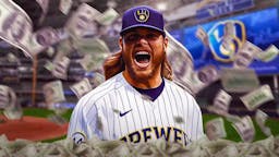Milwaukee Brewers pitcher Corbin Burnes and money floating around him