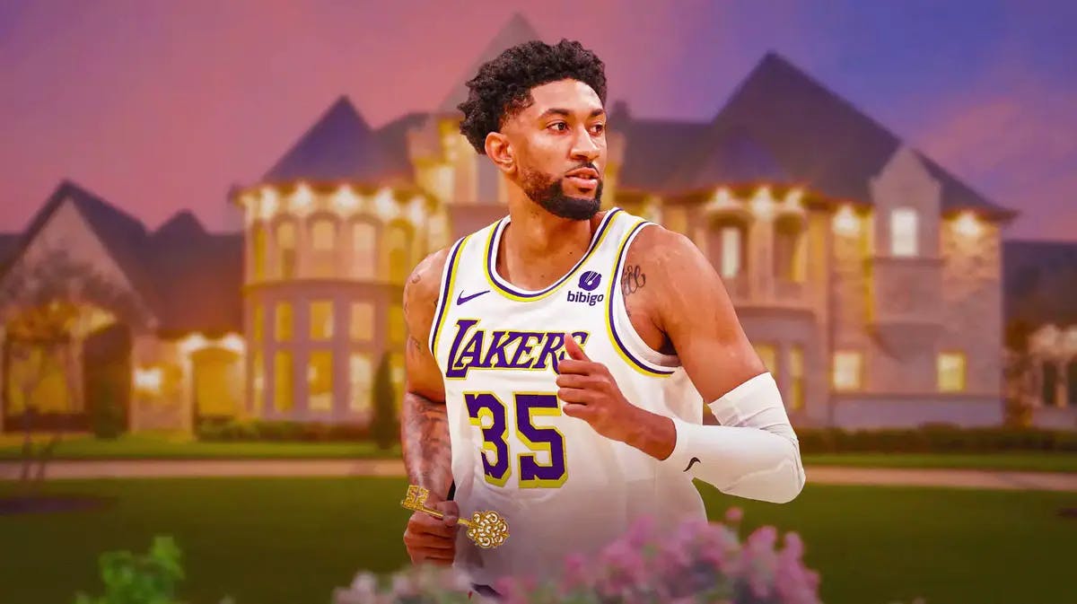 Lakers big Christian Wood in front of a house