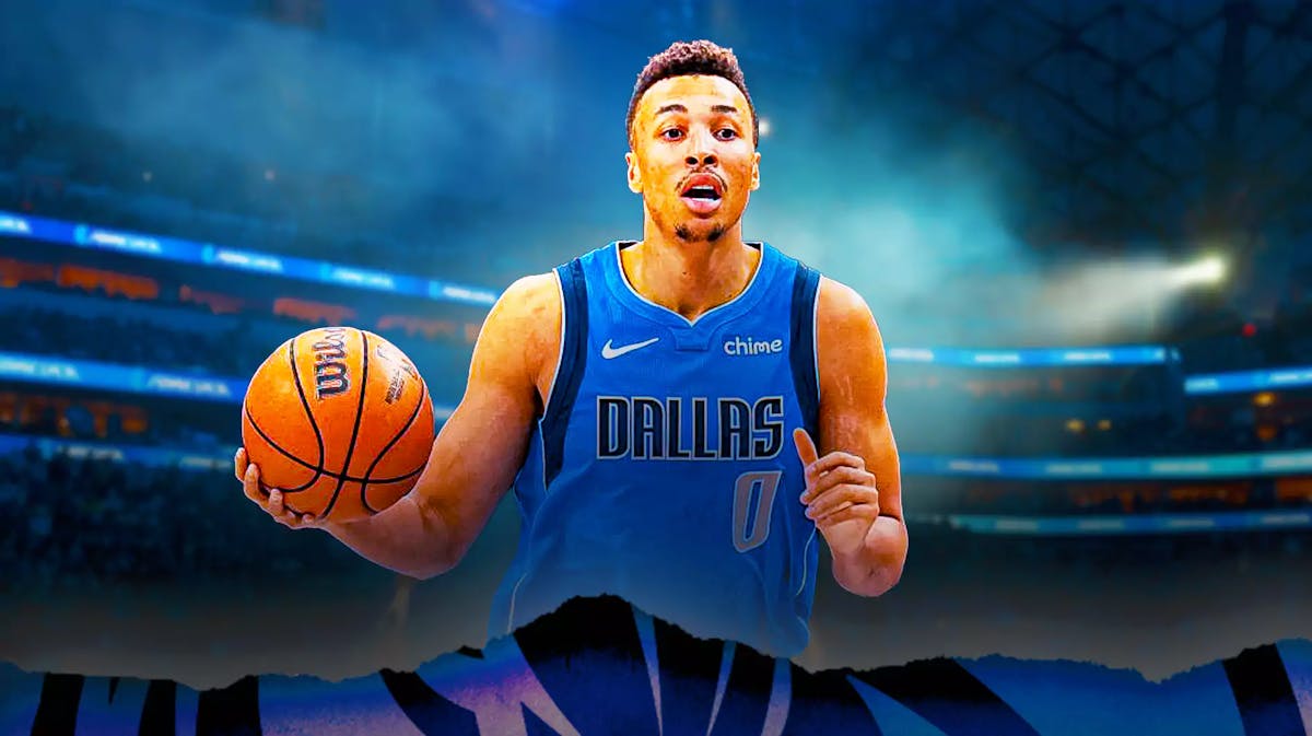 Dante Exum with the Mavs arena in the background, injury