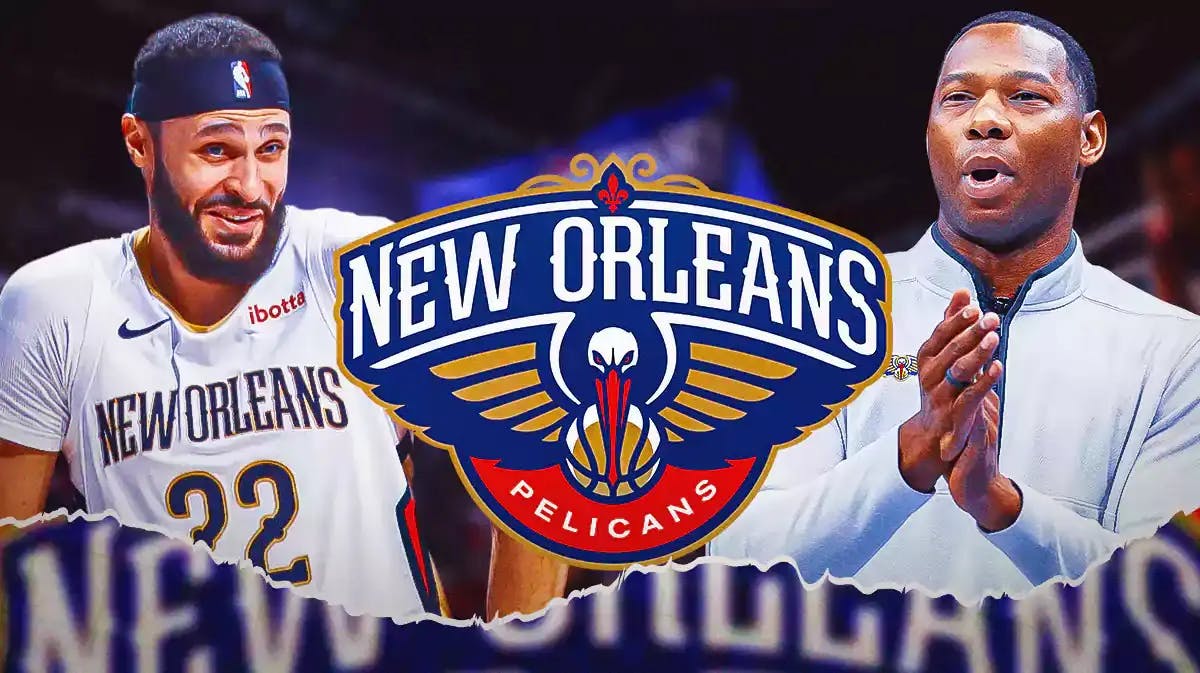 Larry Nance and Willie Green looking excited next to a Pelicans logo