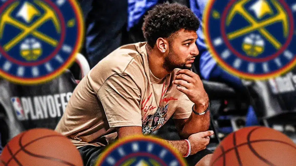 Nuggets' Jamal Murray looking serious sitting on an NBA sideline.