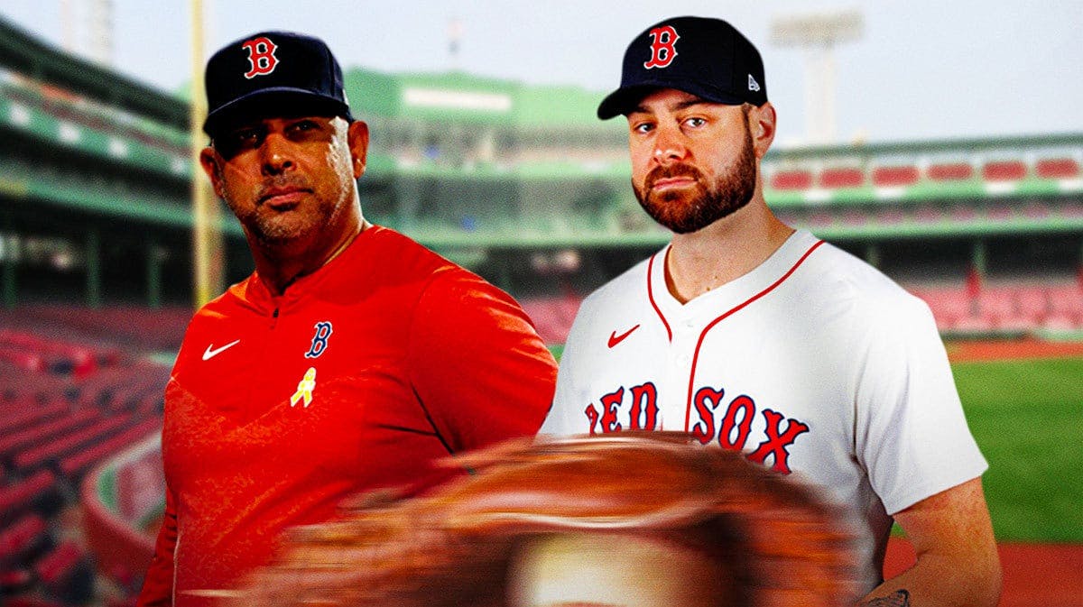 Red Sox’s Alex Cora, Red Sox’s Lucas Giolito (Red Sox uniforms) both looking serious at Fenway Park.