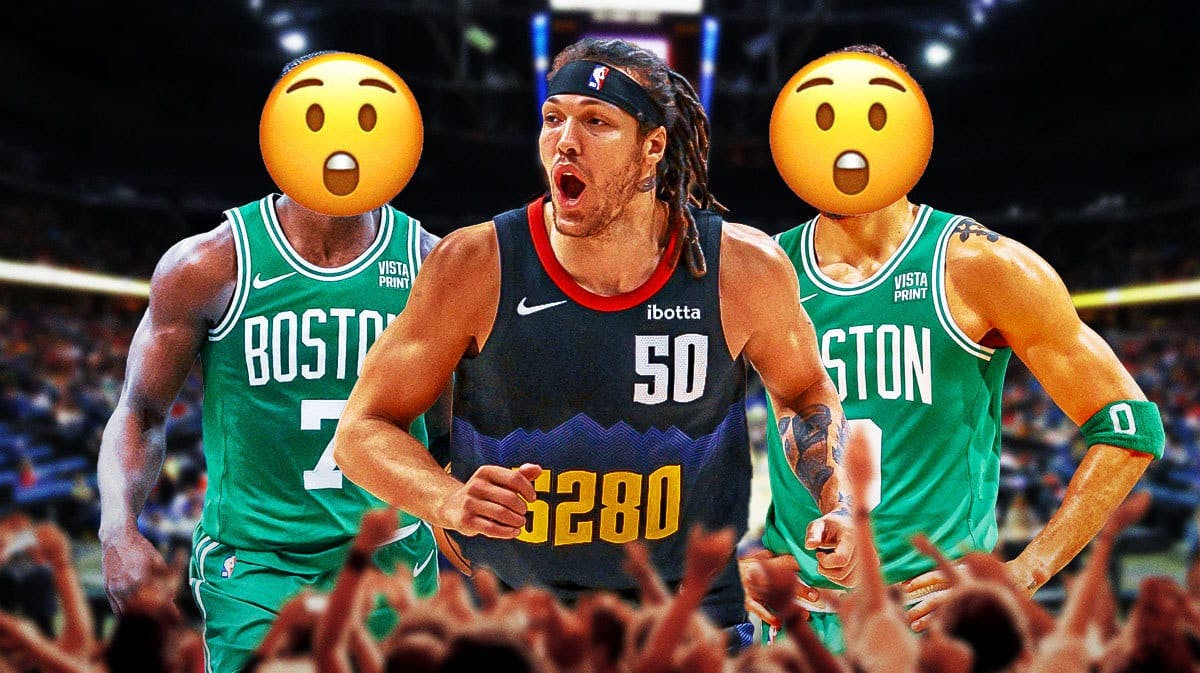 Celtic players with a shocked face looking at Aaron Gordon celebrating