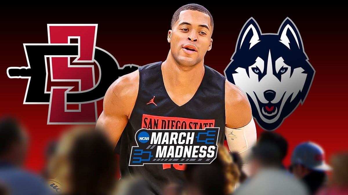 San Diego State basketball's Jaedon LeDee stands next to UConn, March Madness logos before Sweet 16