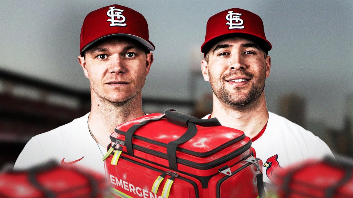 Cardinals' players Sonny Gray and Dylan Carlson with a medical bag on him.