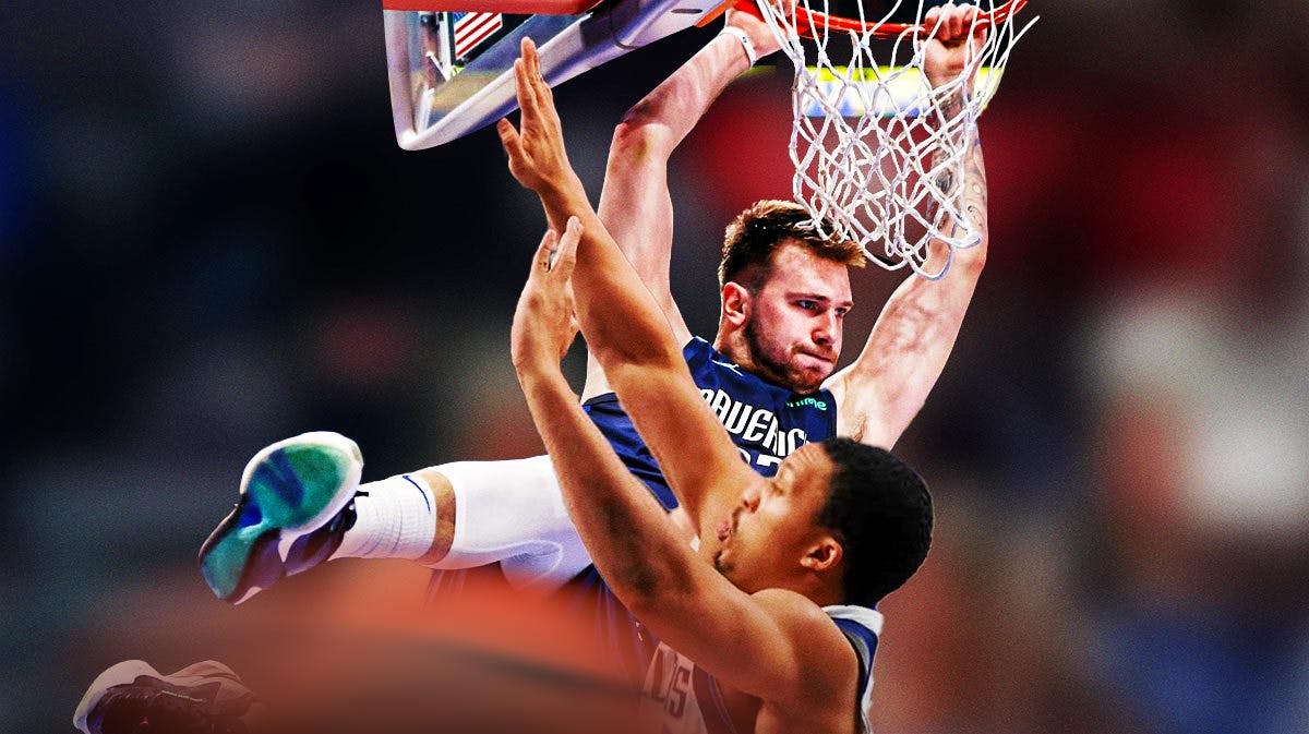 Mavericks' Luka Doncic dunking over Mavericks' Grant Williams.