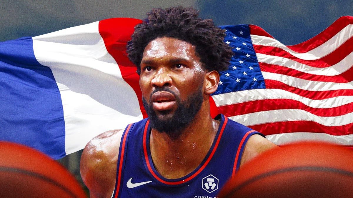 Joel Embiid in front of France's and United States' flags