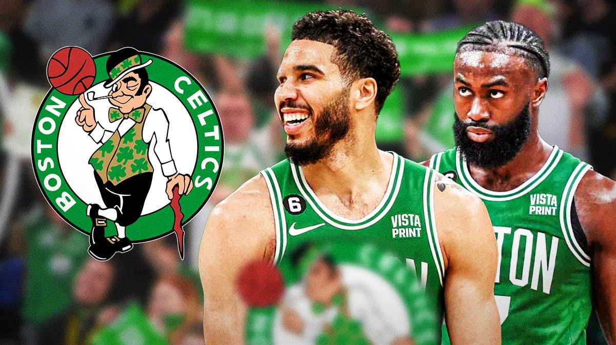 Celtics' Jayson Tatum stands next to Jaylen Brown after injury updates, Knicks fans in background