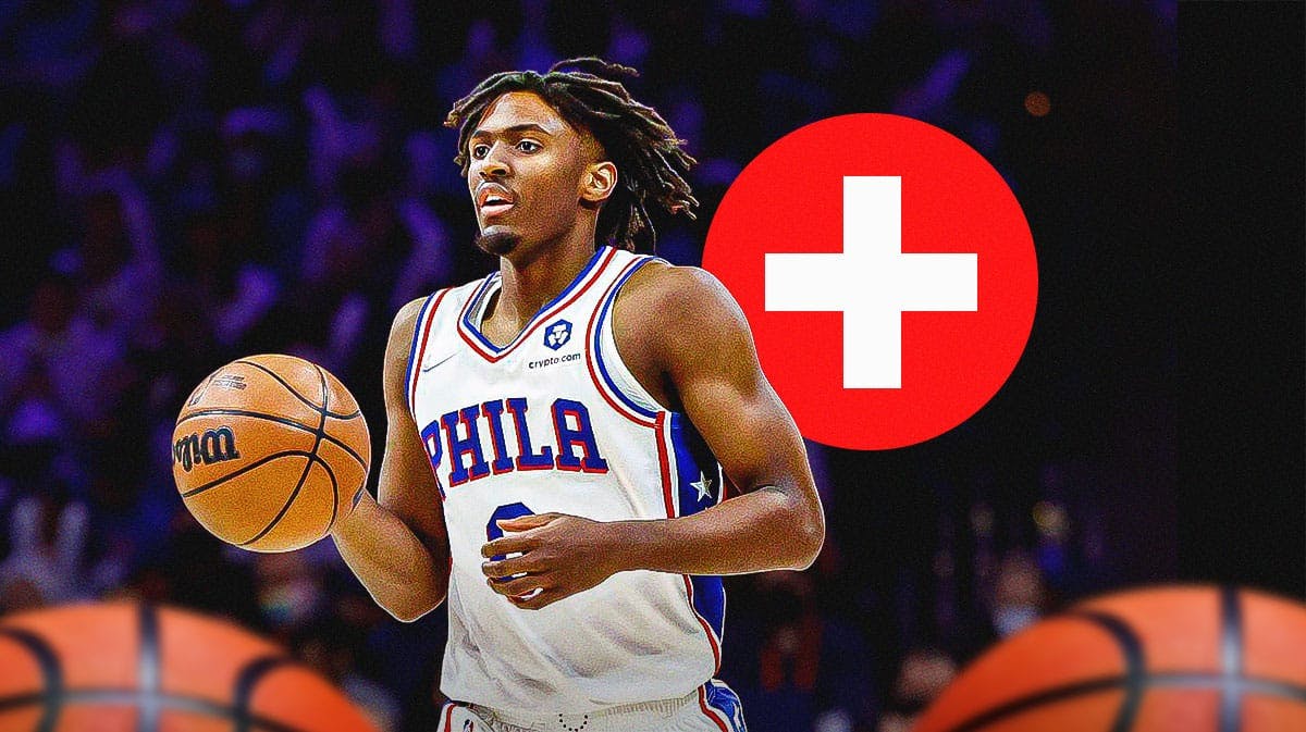 76ers' Tyrese Maxey in front of a healthcare sign