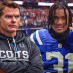 Chris Ballard on one side breathing fire, Adonai Mitchell on the other side in an Indianapolis Colts uniform