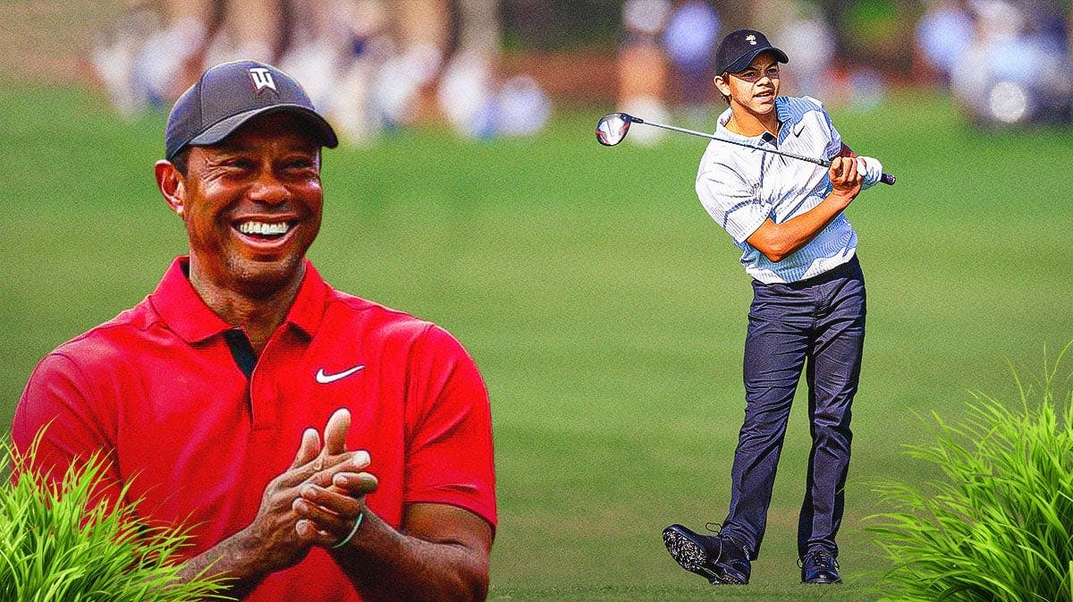 Tiger Woods on left looking at Charlie Woods (Tiger Woods' son) swinging a golf club.