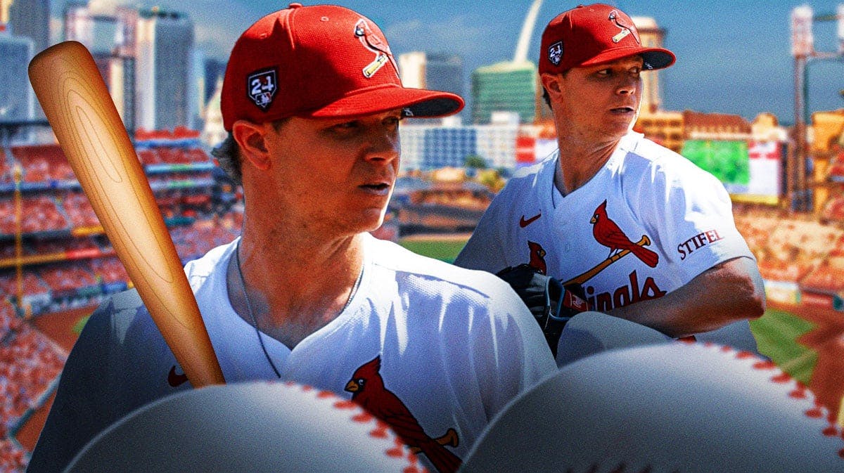 Sonny Gray holding baseball in Cardinals jersey