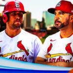 St. Louis Cardinals outfielder Dylan Carlson next to manager Oliver Marmol