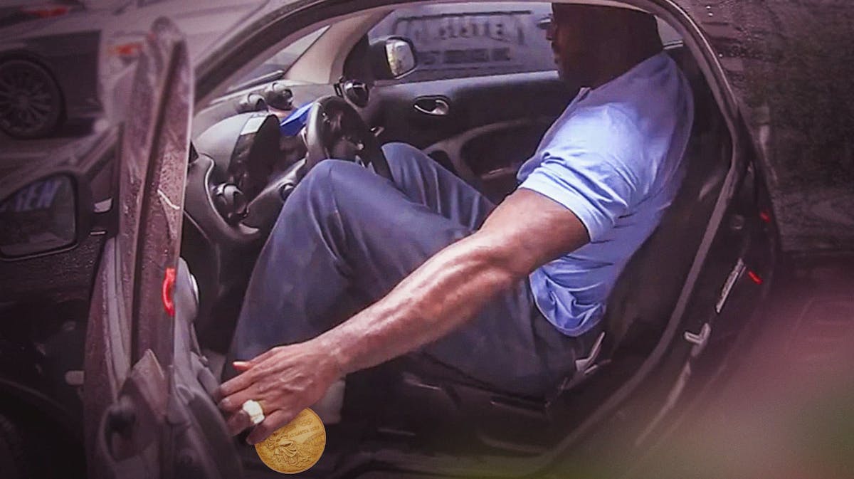 Shaq throwing his 1996 Olympic Medal out of a car