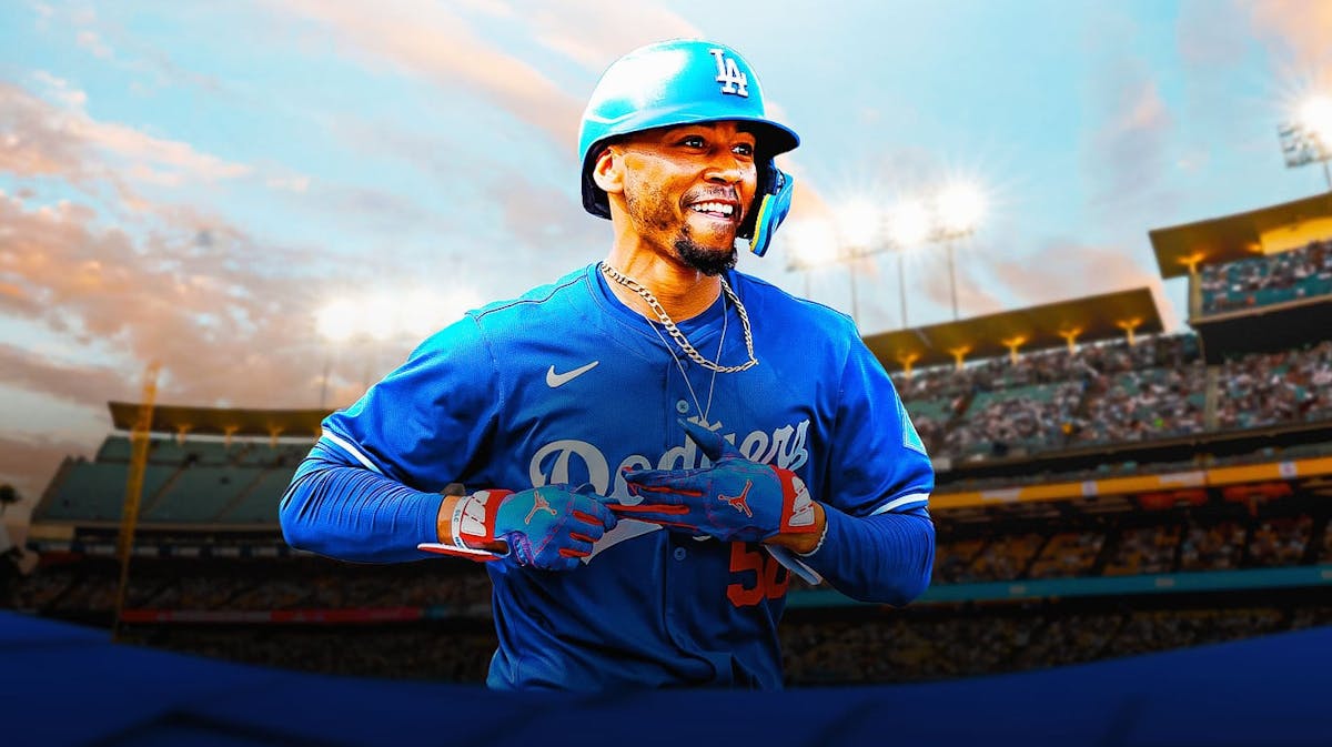 Los Angeles Dodgers' outfielder/infielder Mookie Betts smiling.