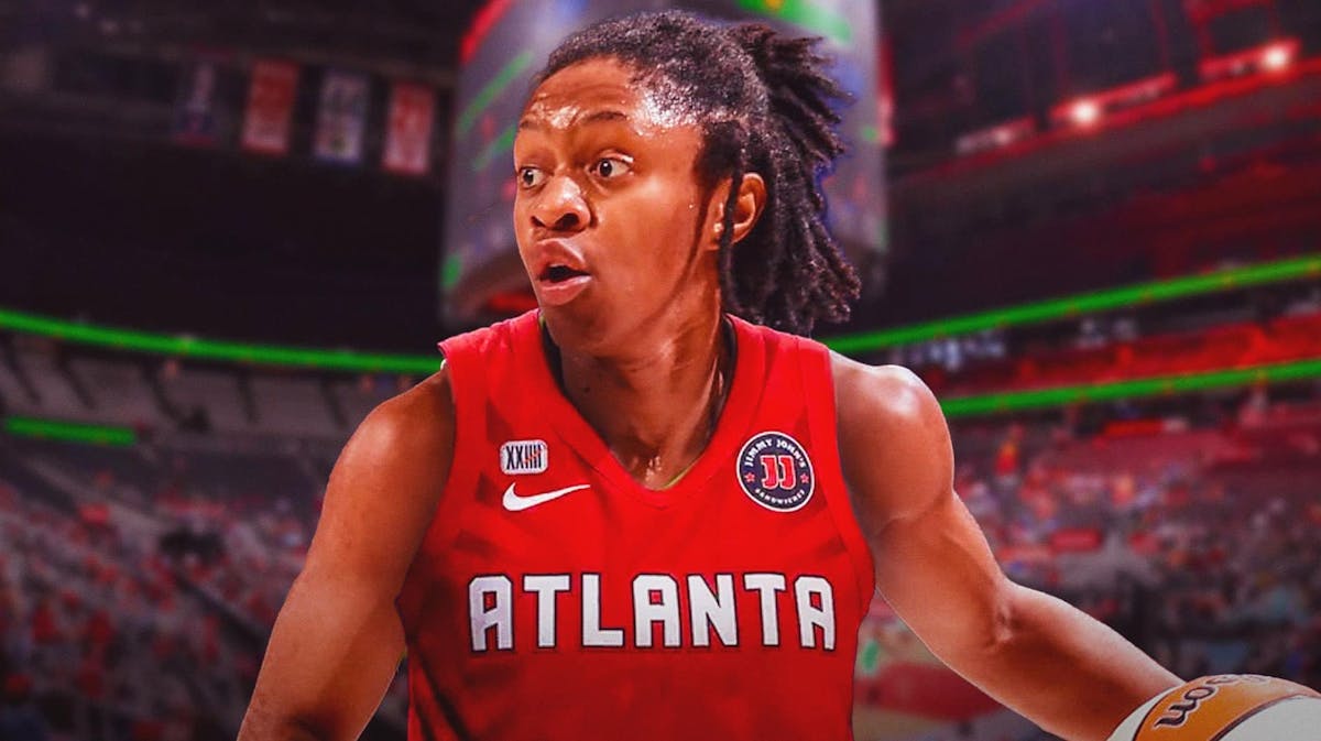 Crystal Dangerfield in an Atlanta Dream jersey wit the Dream arena in the background, Wings trade