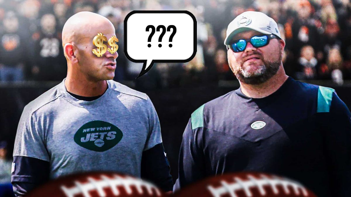 New York Jets general manager Joe Douglas next to head coach Robert Saleh. Saleh has money signs emojis over his eyes and a speech bubble that reads “???”