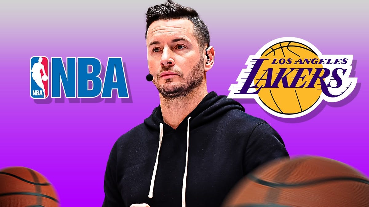 JJ Redick stands next to Lakers logo while Darvin Ham, LeBron James stand in back