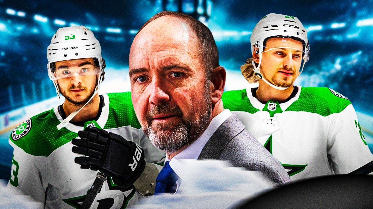 Pete DeBoer in middle of image looking happy, Wyatt Johnston and Roope Hintz on either side, Dallas Stars logo, hockey rink in background