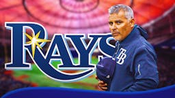 Kevin Cash next to a Rays logo at Tropicana Field