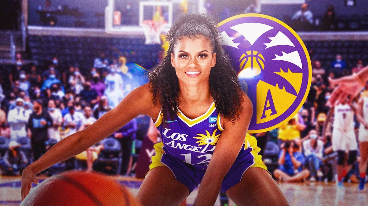 Rae Burrell with the Sparks arena in the background, Aces