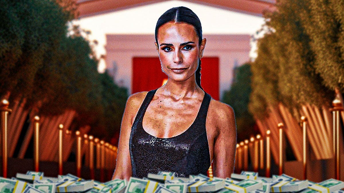 Jordana Brewster surrounded by piles of cash.