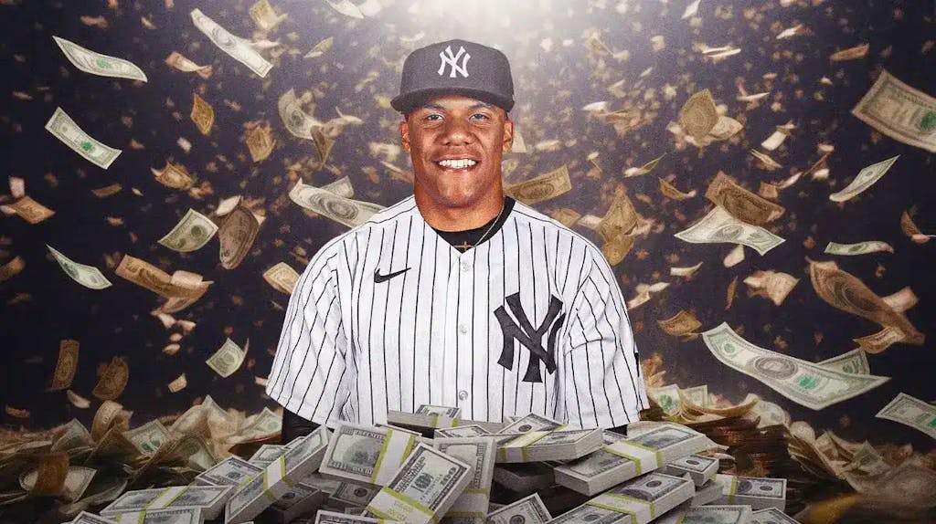 Juan Soto surrounded by piles of cash.