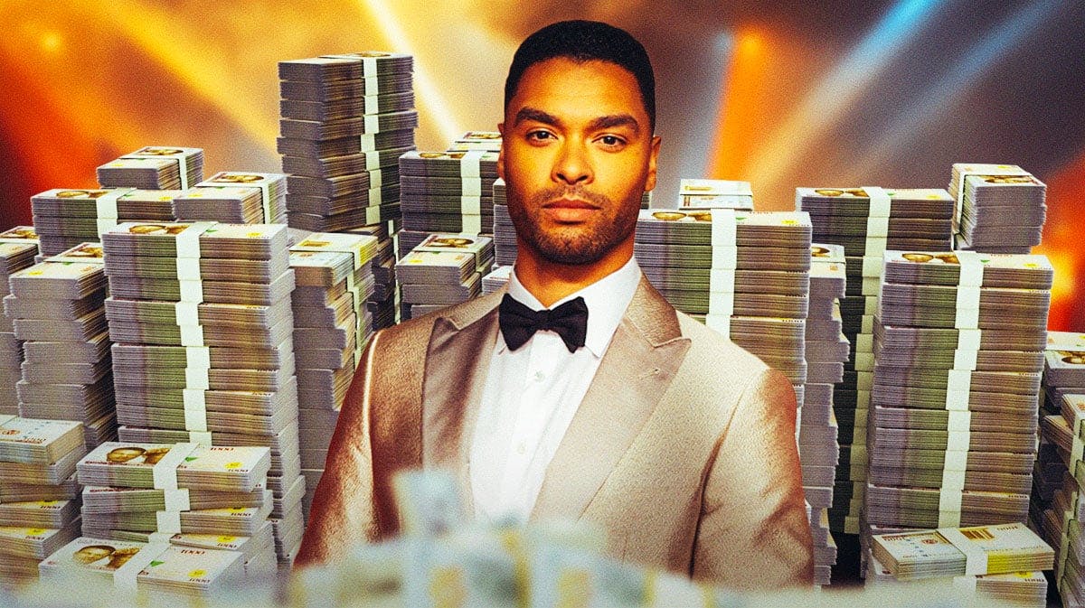 Regé-Jean Page surrounded by piles of cash.