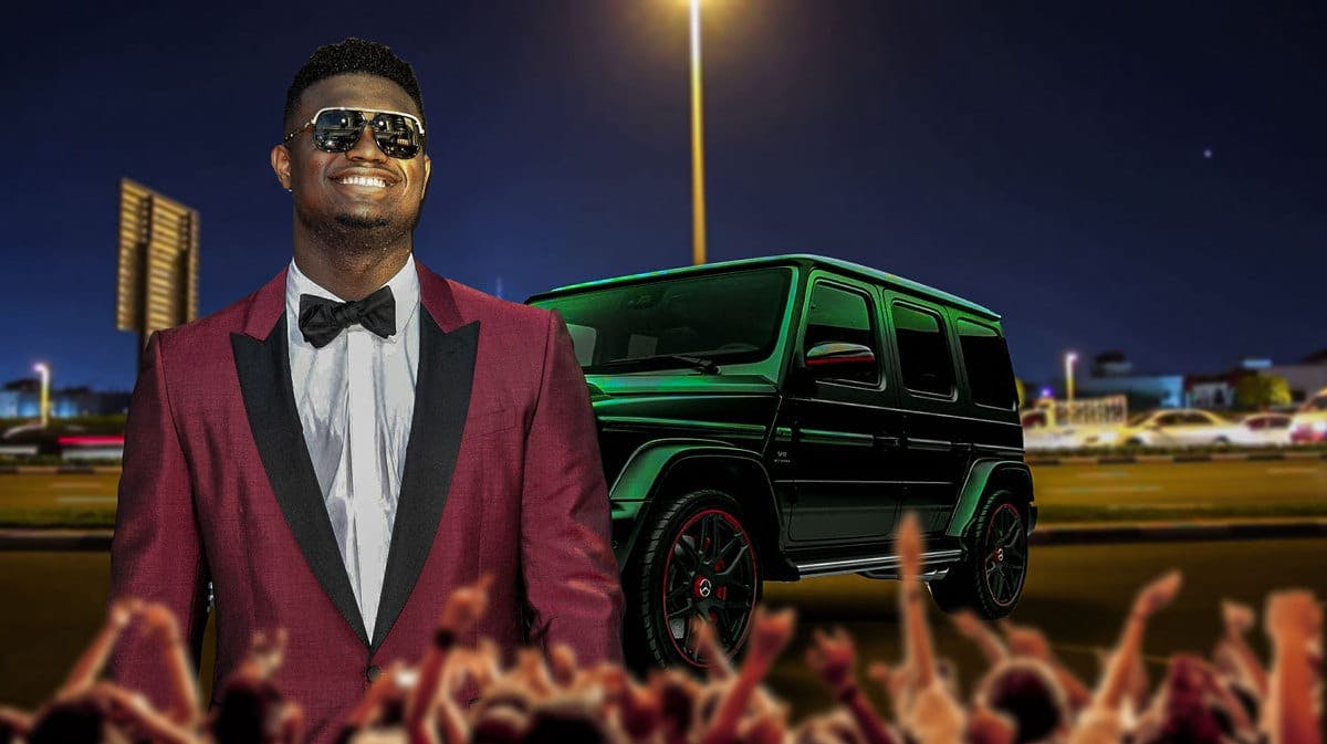 Zion Williamson in front of a Mercedes AMG G63.