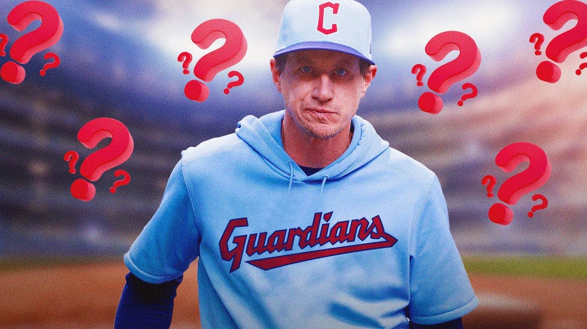 Craig Counsell in a Cleveland Guardians sweatshirt with question marks around him