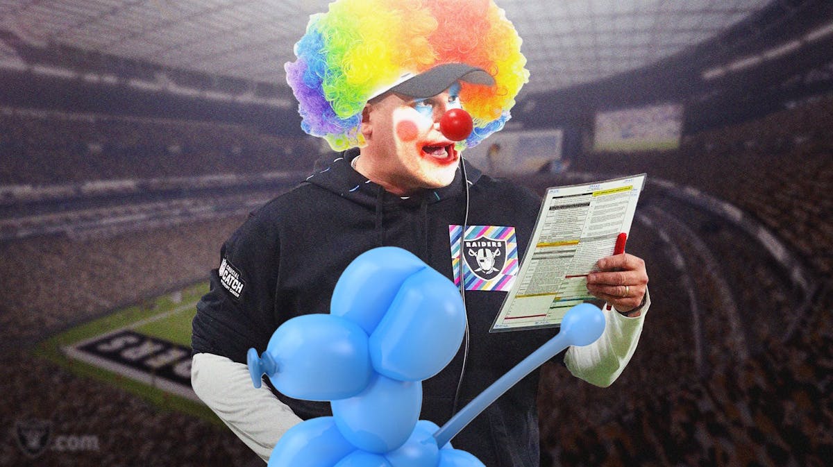 Raiders coach Josh McDaniels looking like a clown while holding a clipboard.