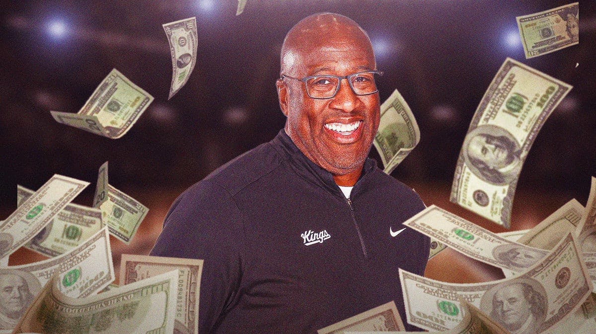 Sacramento Kings coach Mike Brown with cash raining down.